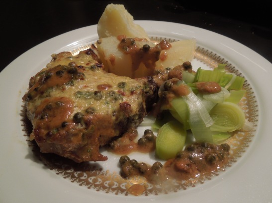 Image of chops served with boiled potatoes and leeks